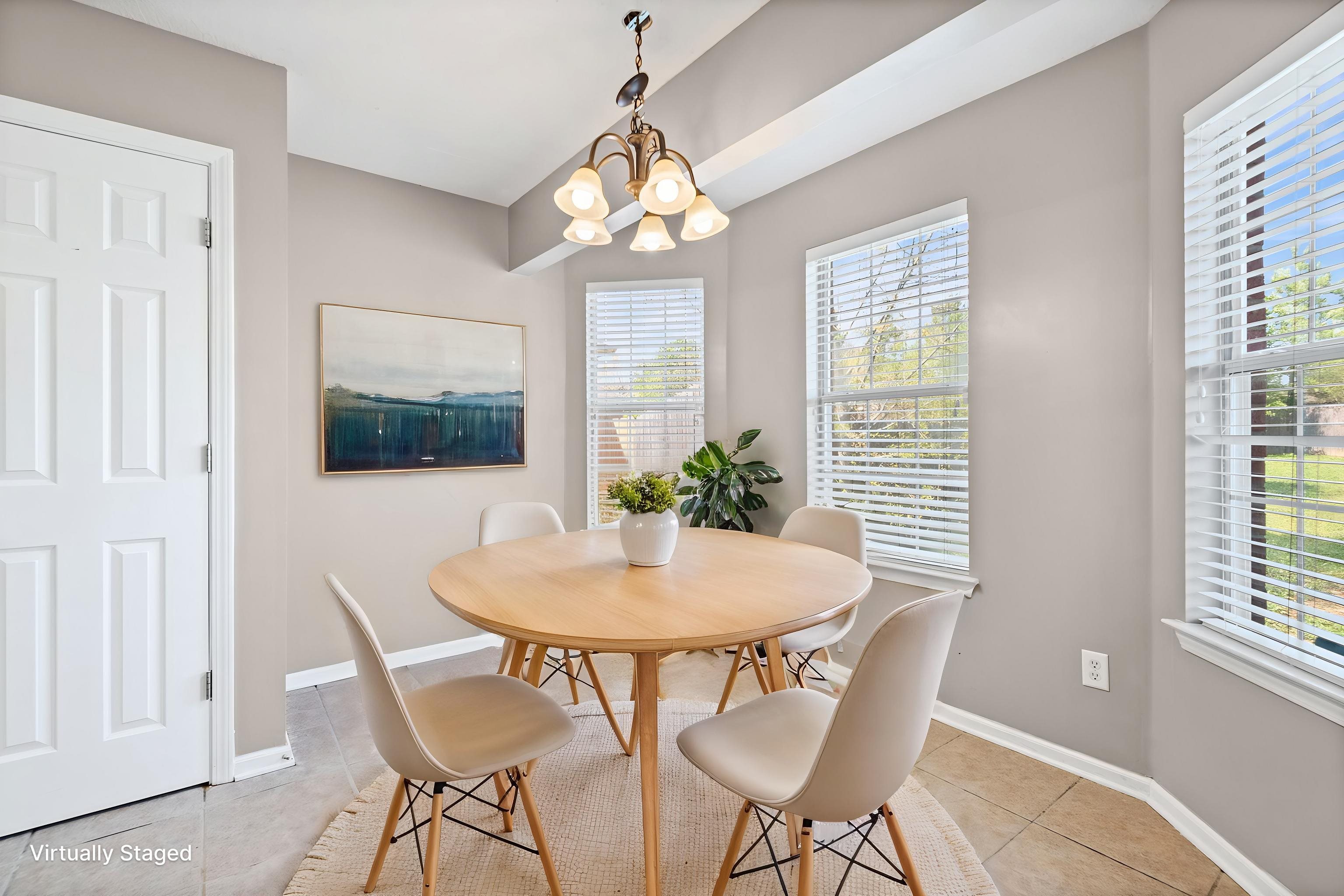 10018 Cameron Ridge Trail Memphis, TN 38016 - Photo 11 of 29 a view of a dining room with furniture and window