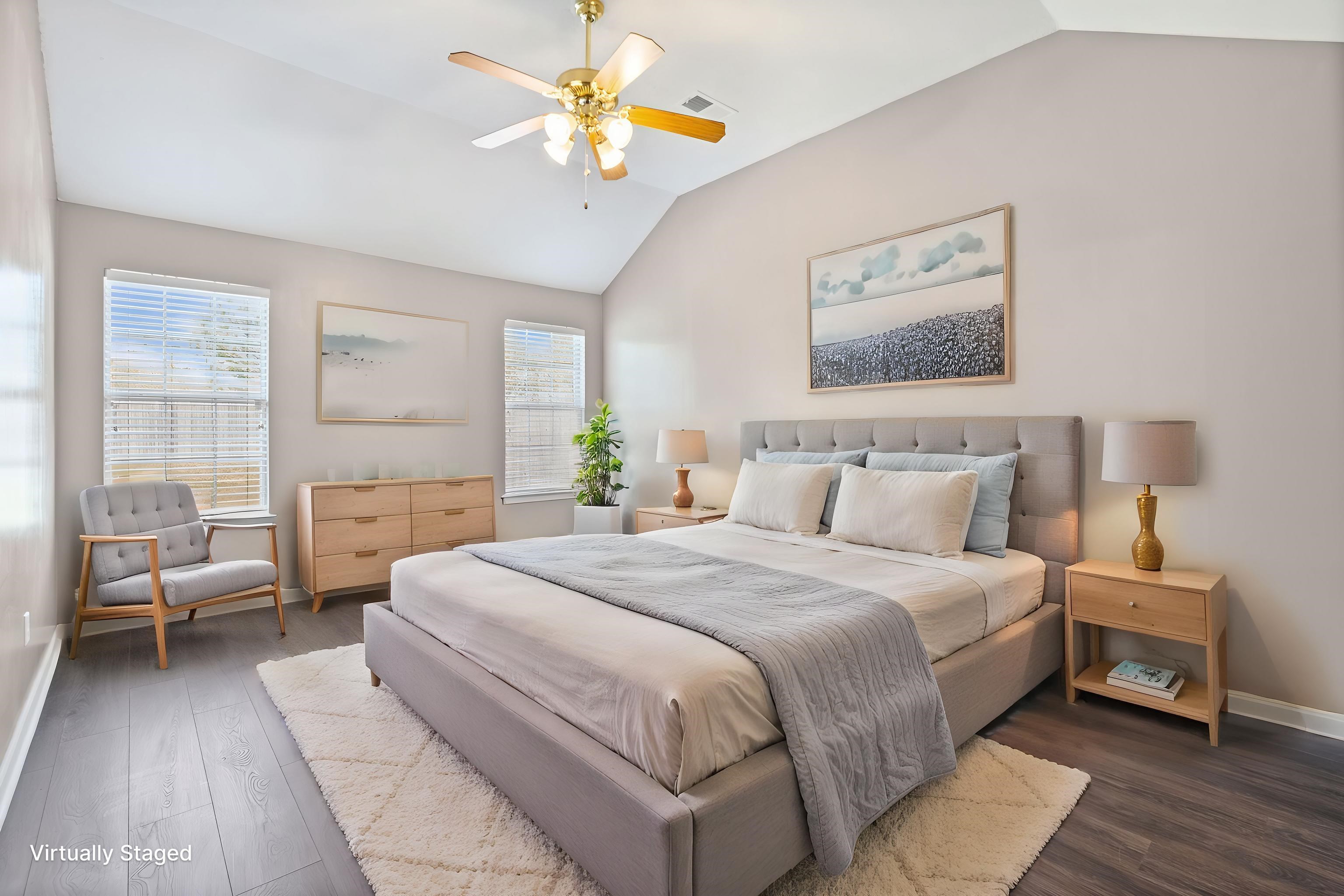 10018 Cameron Ridge Trail Memphis, TN 38016 - Photo 13 of 29 a bedroom with a bed and a chandelier