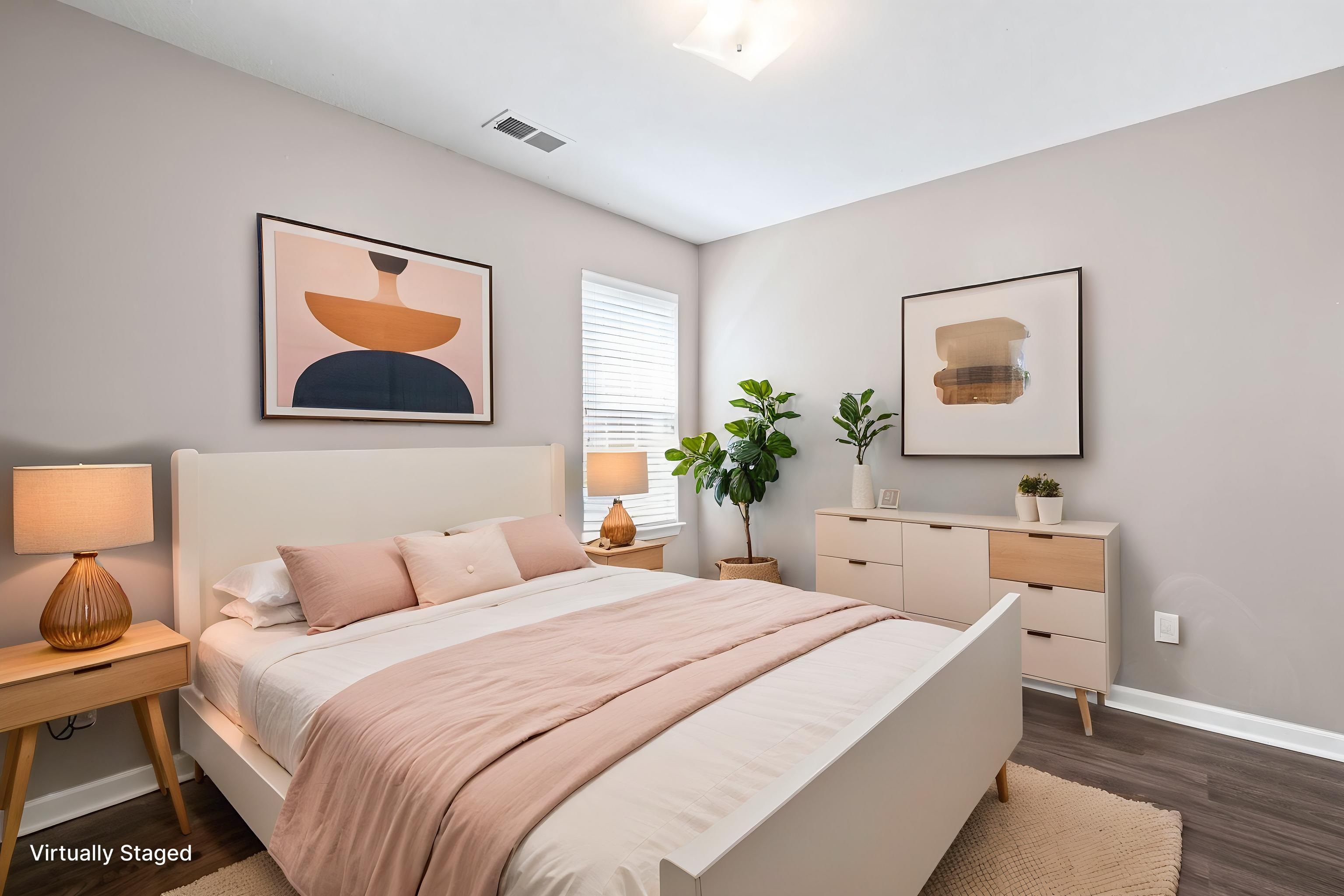 10018 Cameron Ridge Trail Memphis, TN 38016 - Photo 22 of 29 a bedroom with a bed and a painting on the wall