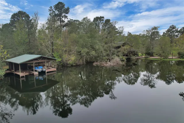 a view of lake with green space