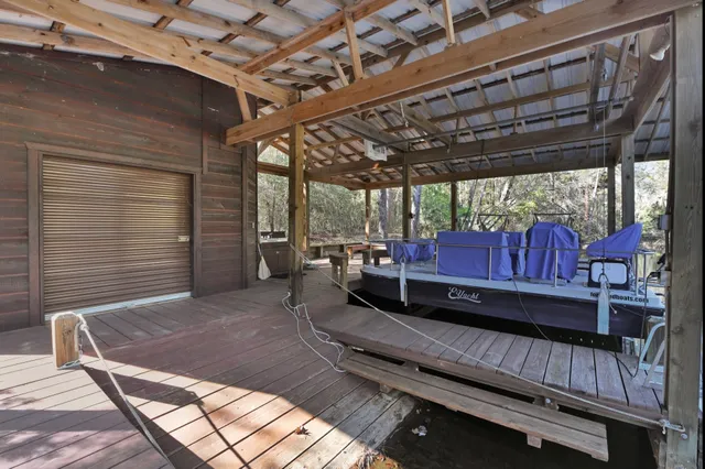 a view of living room with furniture and fireplace