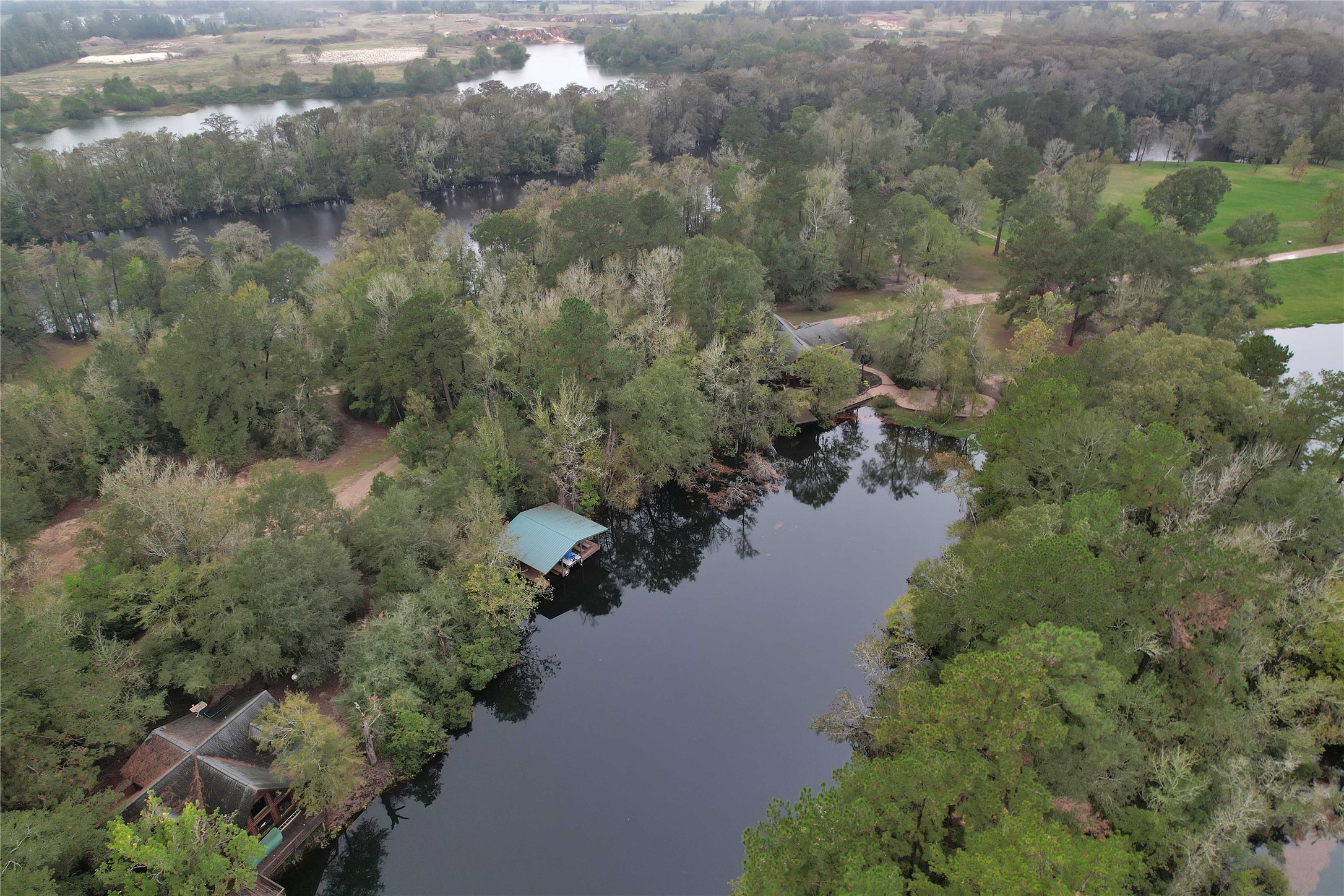 69 Artesian Avenue Cleveland, TX 77327 - Photo 38 of 43 an aerial view of a houses with yard