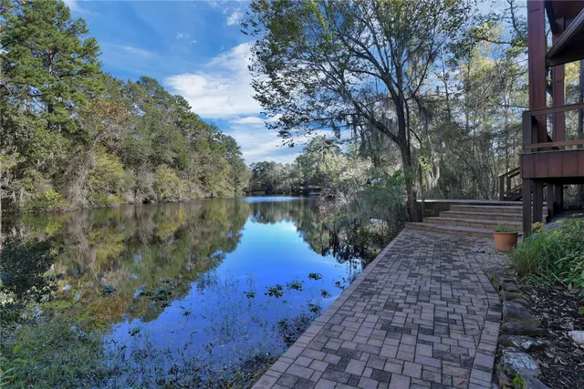 a view of backyard with seating space