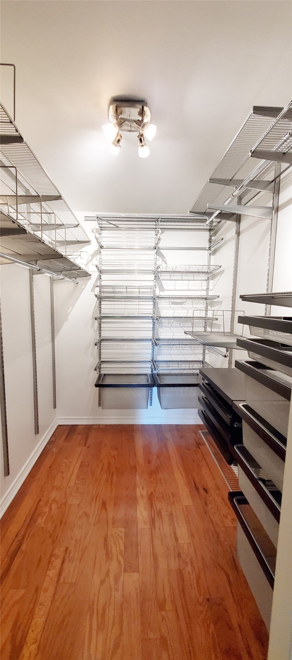 5630 Edith Street Houston, TX 77081 - Photo 16 of 30 Wonderful walk in closet with Elfa system. There is another closet in primary bedroom