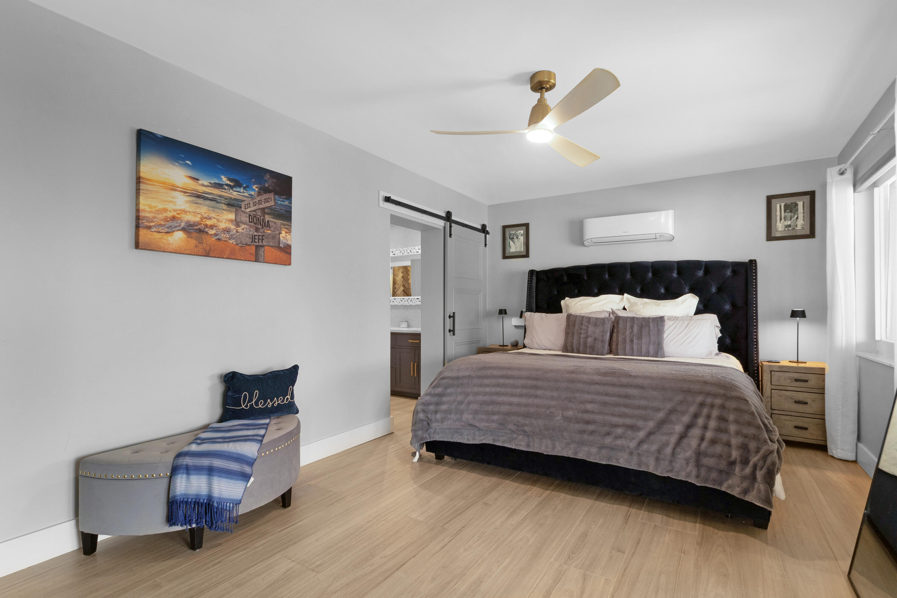 291 Southeast 5th Avenue Pompano Beach, FL 33060 - Photo 17 of 62 a bedroom with bed and wooden floor