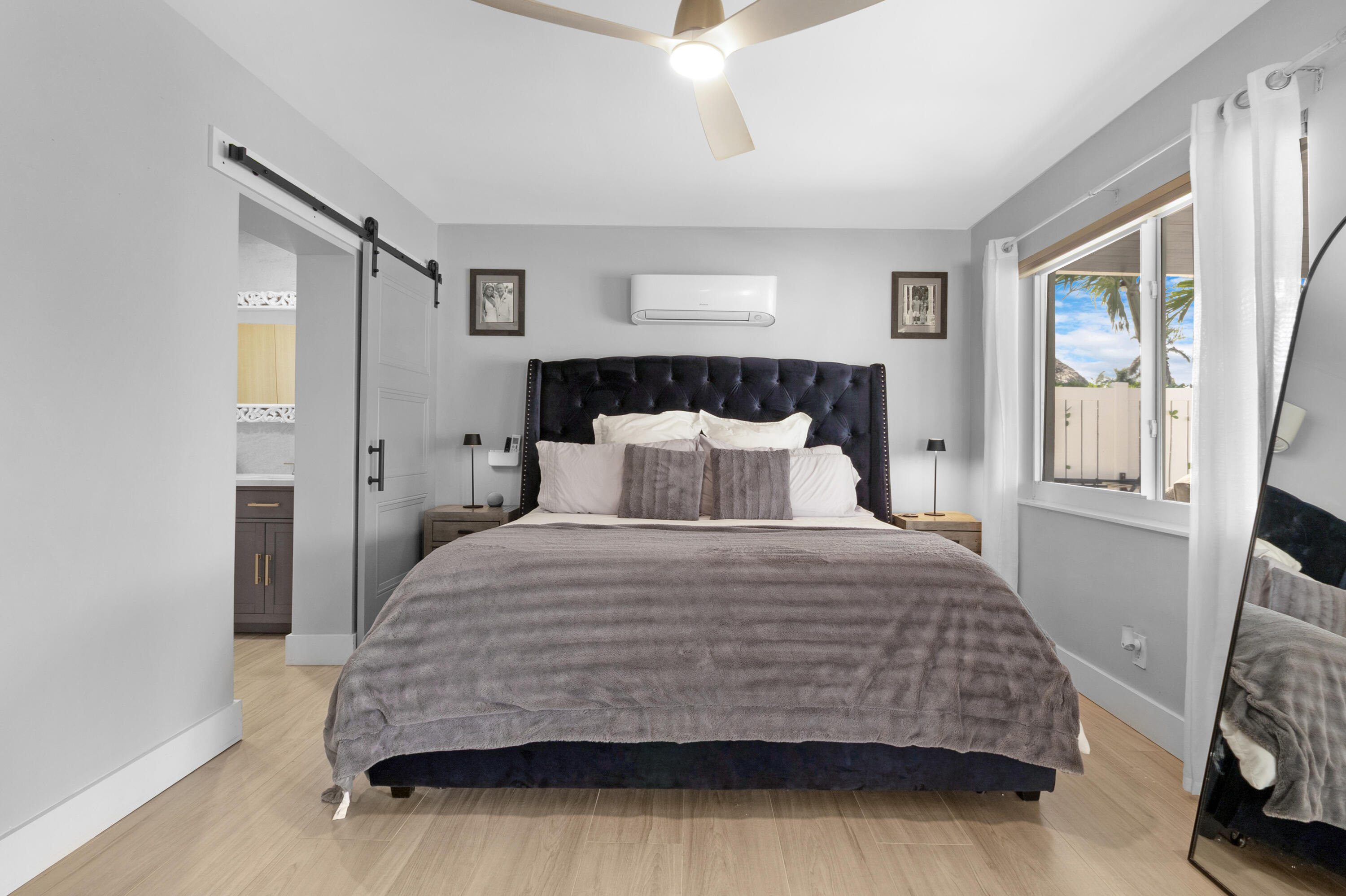 291 Southeast 5th Avenue Pompano Beach, FL 33060 - Photo 18 of 62 a bedroom with a bed and window