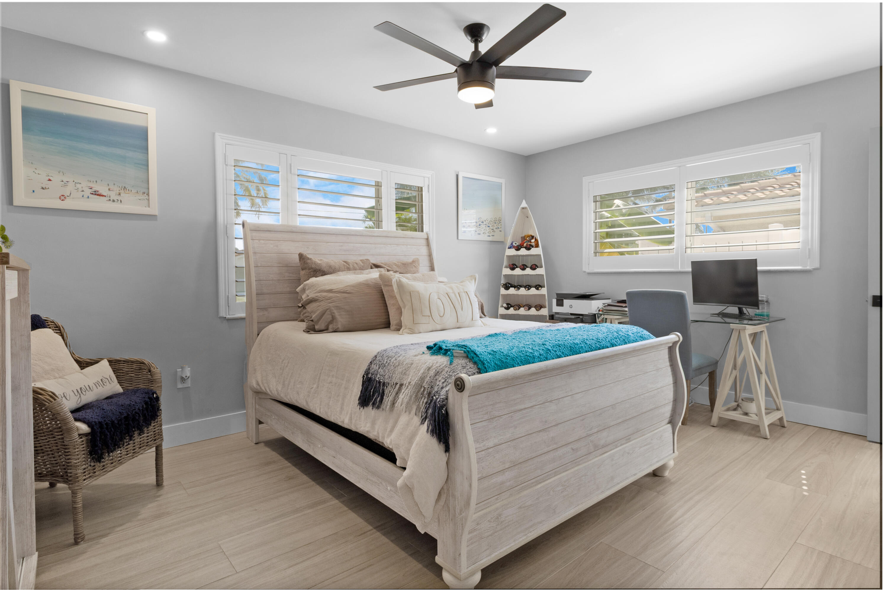 291 Southeast 5th Avenue Pompano Beach, FL 33060 - Photo 23 of 62 a bed sitting in a bedroom next to a window