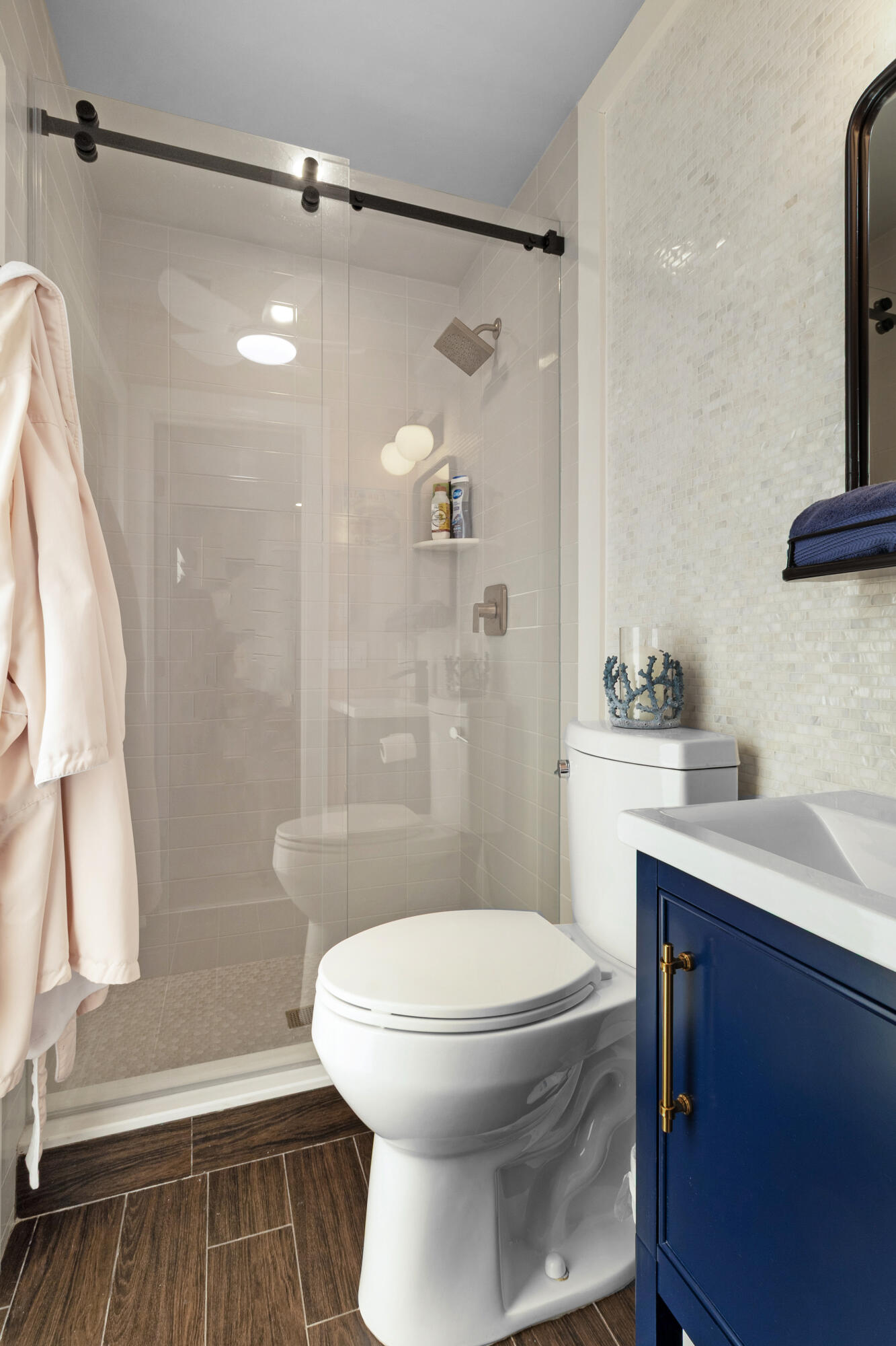 291 Southeast 5th Avenue Pompano Beach, FL 33060 - Photo 25 of 62 a bathroom with a sink a toilet and shower