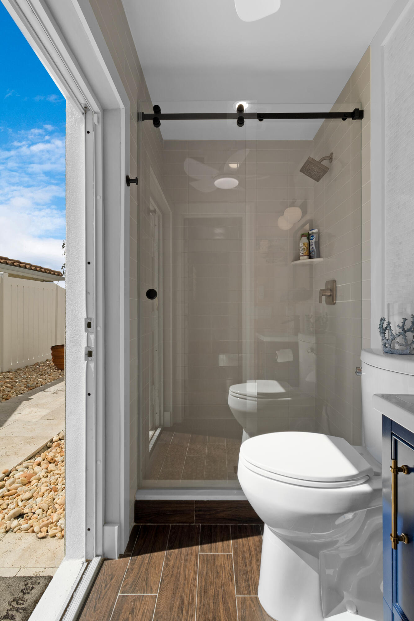 291 Southeast 5th Avenue Pompano Beach, FL 33060 - Photo 26 of 62 a bathroom with a toilet and a shower