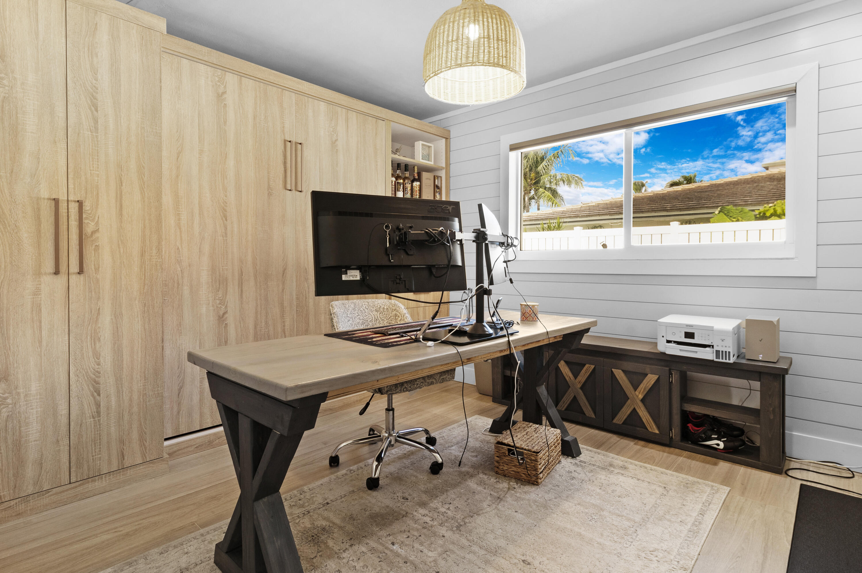 291 Southeast 5th Avenue Pompano Beach, FL 33060 - Photo 27 of 62 a view of a workspace with furniture and a window