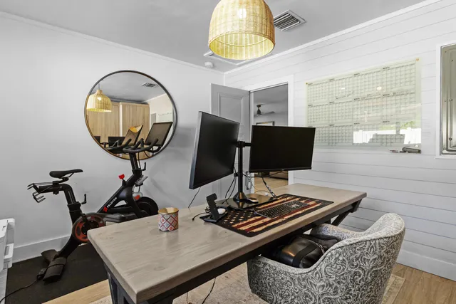 a view of a swimming pool with an outdoor seating