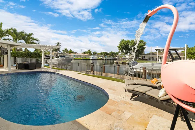 a view of a chairs and table in the patio