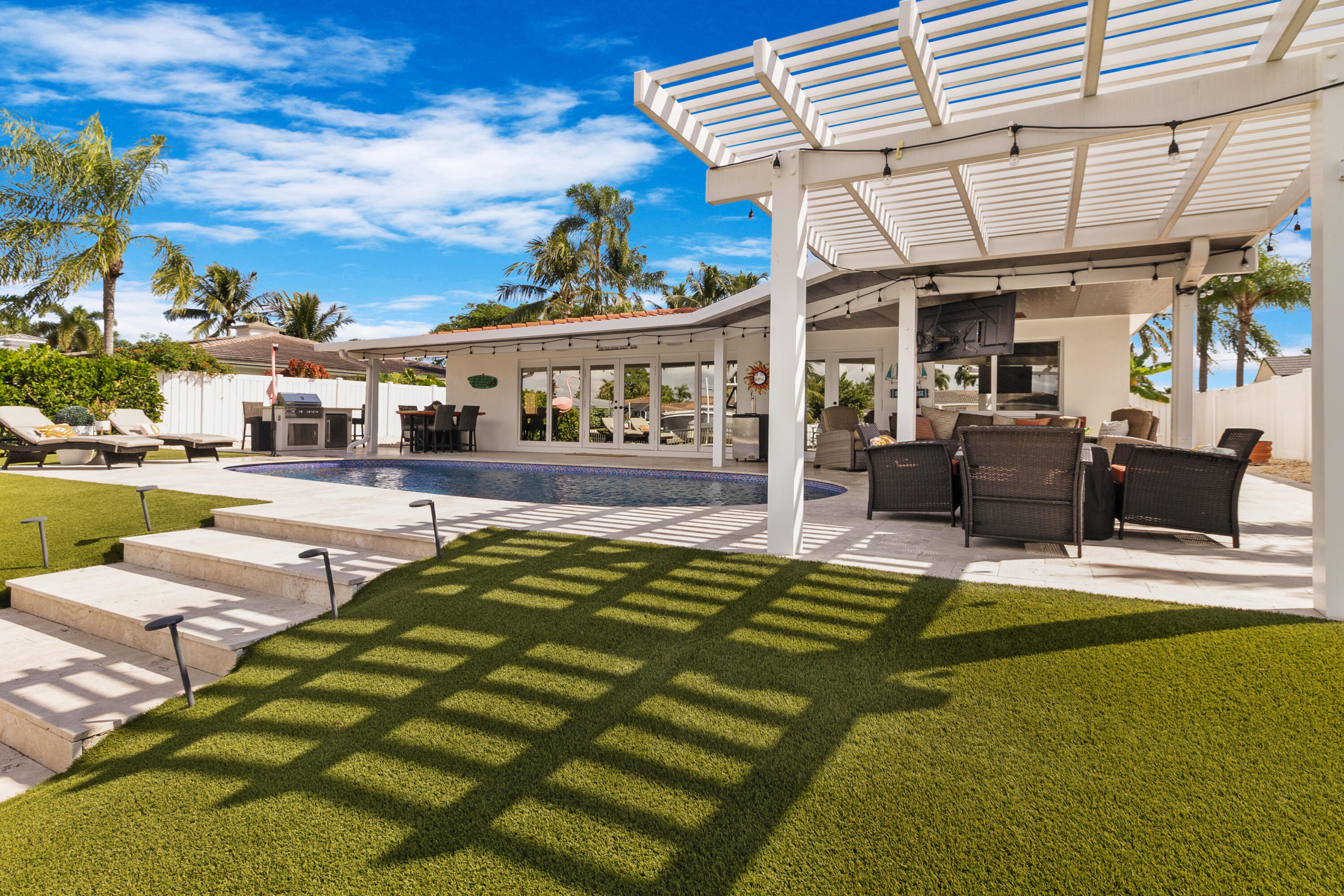291 Southeast 5th Avenue Pompano Beach, FL 33060 - Photo 34 of 62 a view of a house with swimming pool