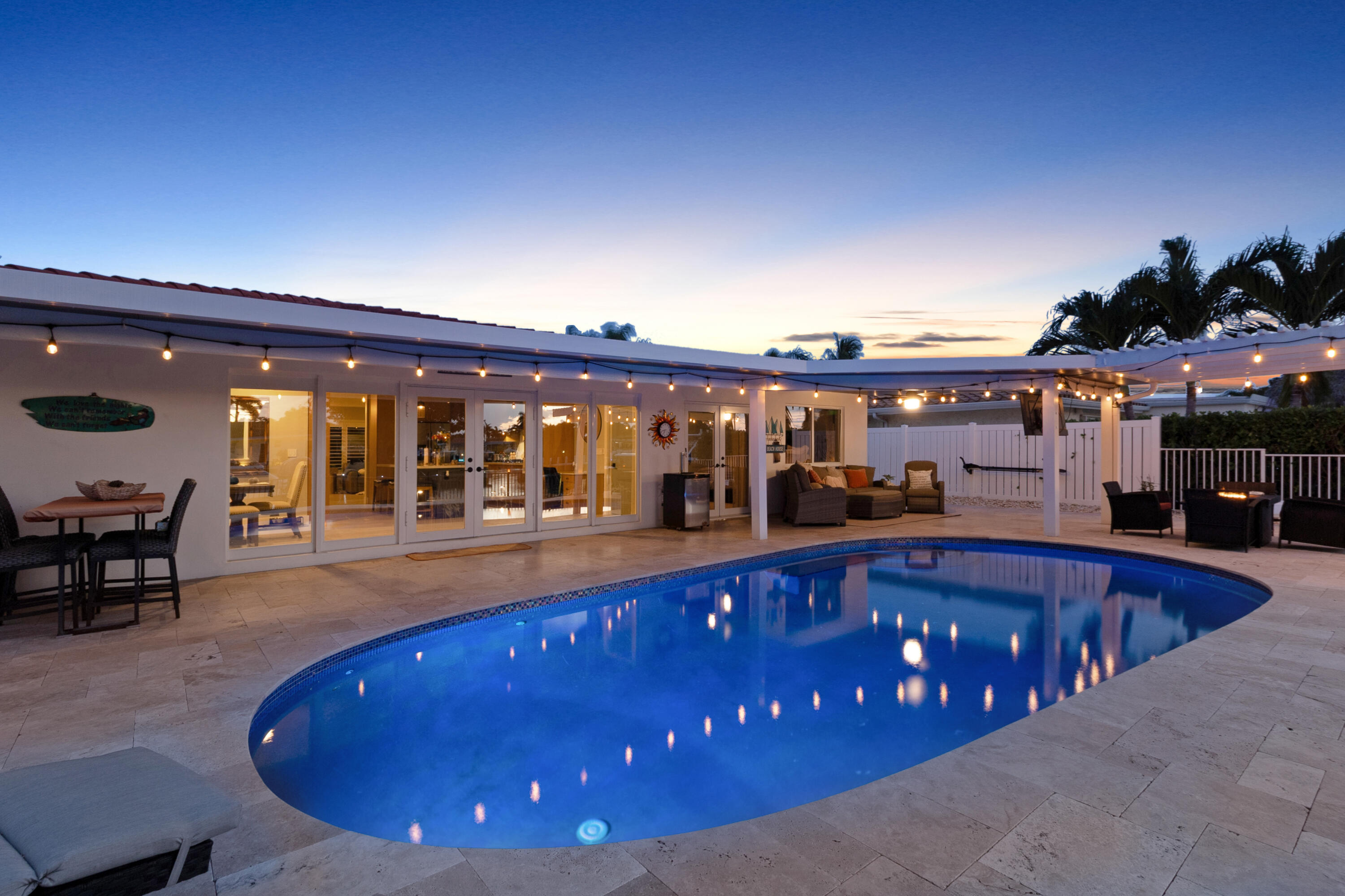 291 Southeast 5th Avenue Pompano Beach, FL 33060 - Photo 41 of 62 a view of a swimming pool with outdoor seating