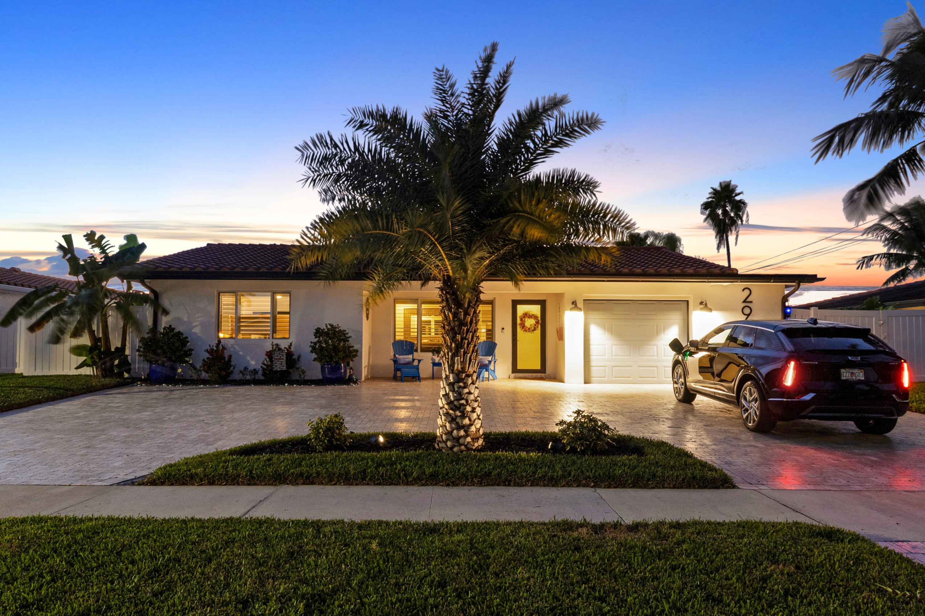 291 Southeast 5th Avenue Pompano Beach, FL 33060 - Photo 47 of 62 a front view of a house with garden