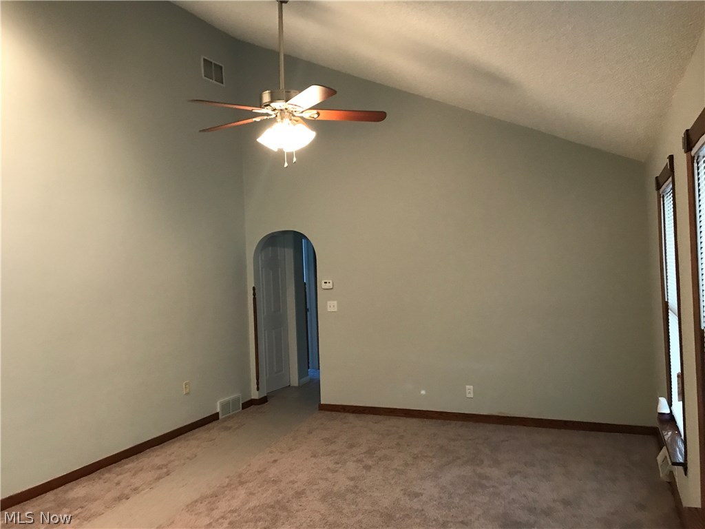 4199 Mayfair Road Uniontown, OH 44685 - Photo 19 of 22 Living room with beautiful vaulted ceiling