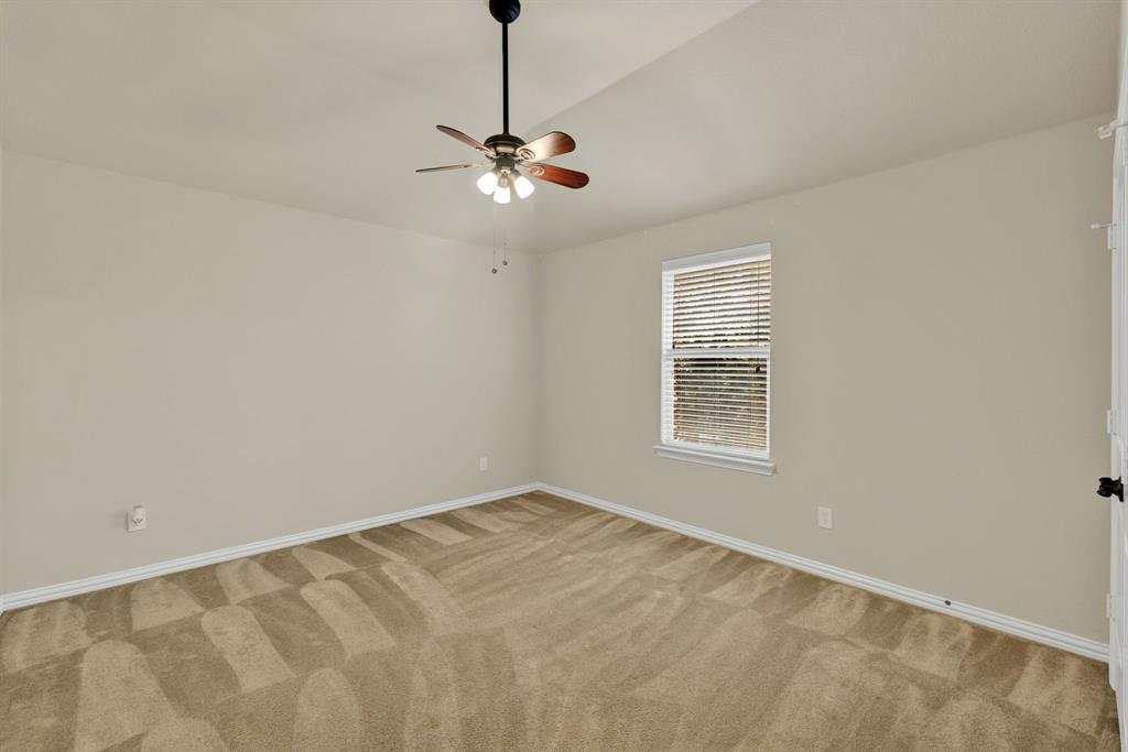 1701 Meadow Ranch Road McKinney, TX 75071 - Photo 25 of 40 a view of an empty room with a window