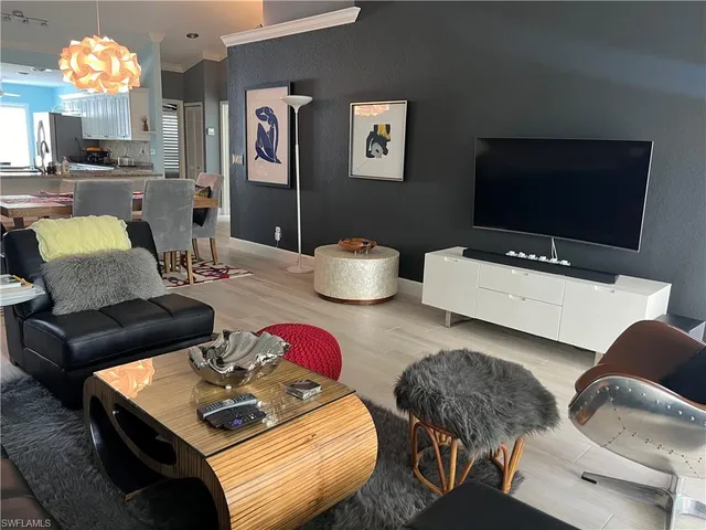 a living room with furniture and window