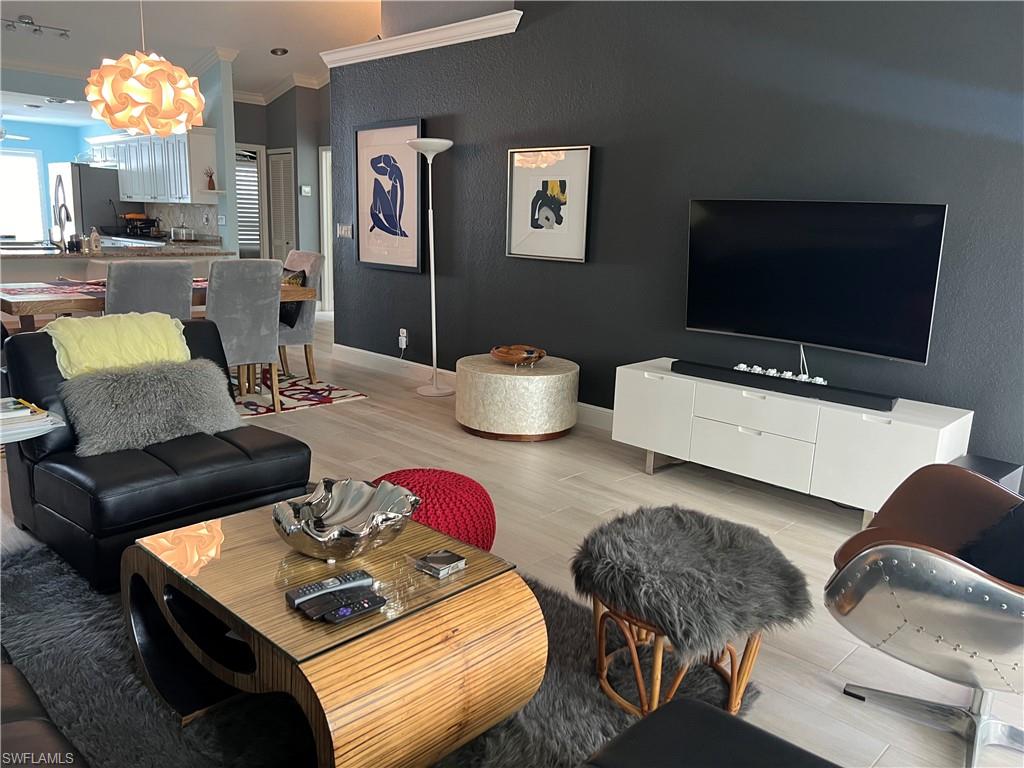 a living room with furniture and window