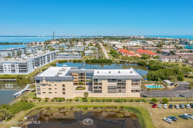 a view of swimming pool from a balcony