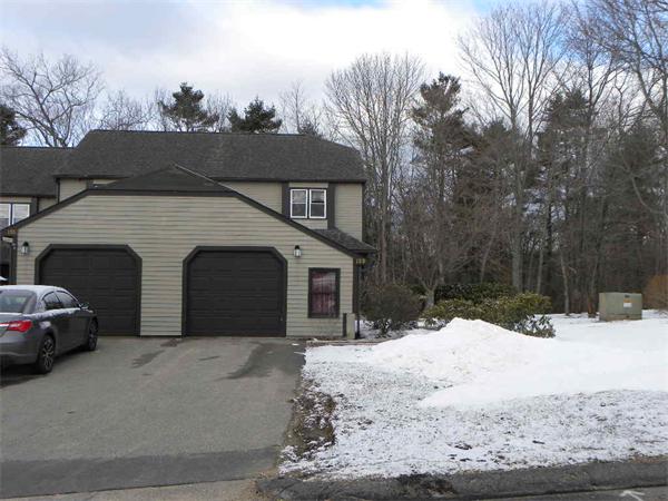 19 Highfield Road, Unit D Charlton, MA 01507 - Photo 1 of 19 a view of a house with a snow in the yard