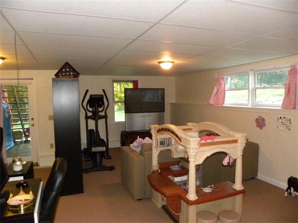 19 Highfield Road, Unit D Charlton, MA 01507 - Photo 18 of 19 a utility room with closet dryer and washer