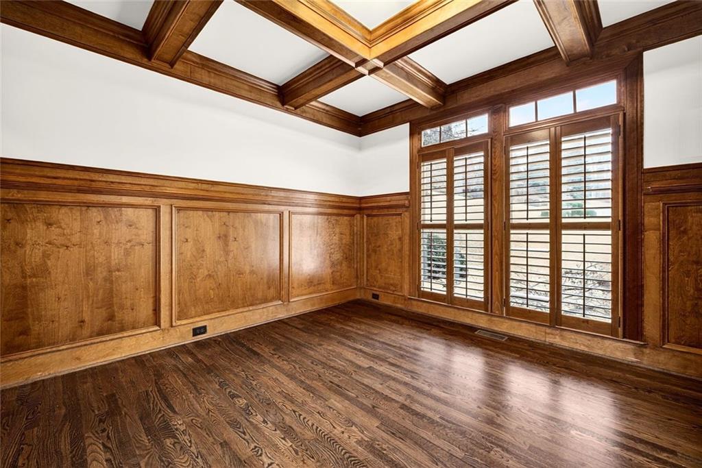 2910 Creek Tree Lane Cumming, GA 30041 - Photo 15 of 75 a view of an empty room with wooden floor and a window