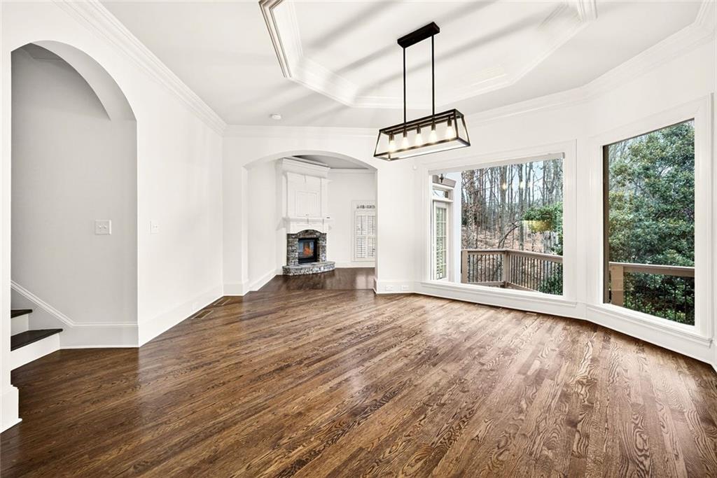 2910 Creek Tree Lane Cumming, GA 30041 - Photo 29 of 75 a view of empty room with wooden floor and windows