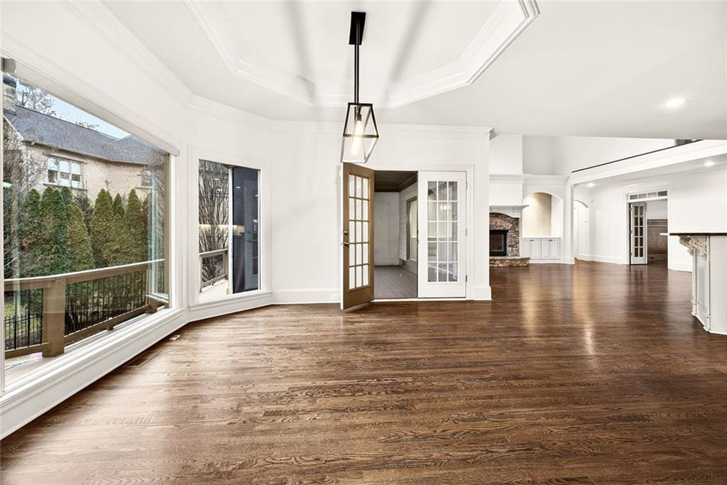 2910 Creek Tree Lane Cumming, GA 30041 - Photo 30 of 75 a view of empty room with wooden floor and fan