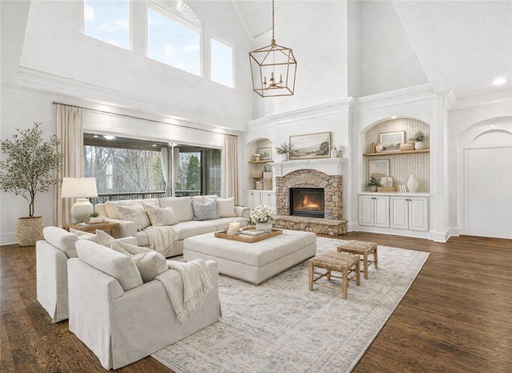 2910 Creek Tree Lane Cumming, GA 30041 - Photo 3 of 75 a living room with furniture fireplace and a table