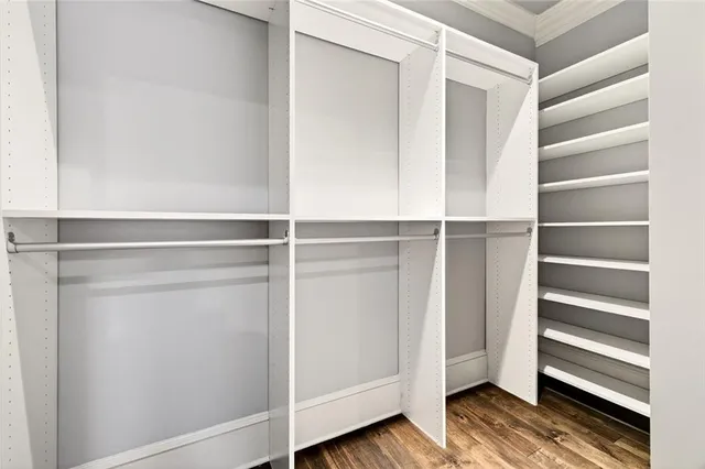 a kitchen with granite countertop a sink and a stove