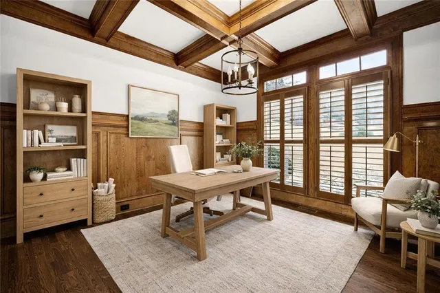 a spacious bedroom with a bed and wooden floor