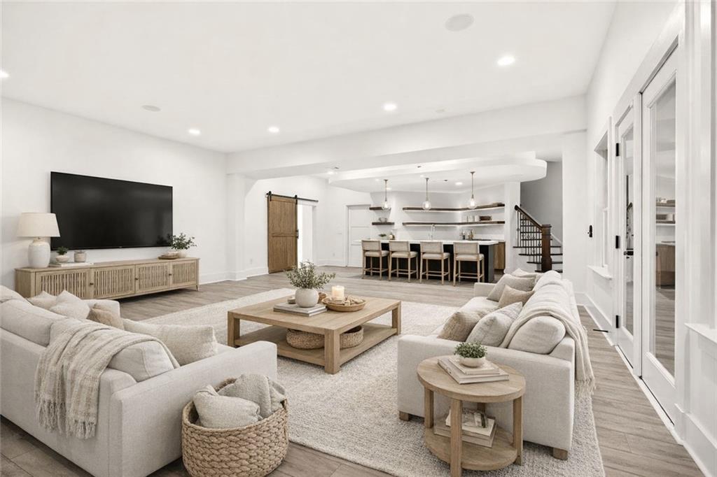 2910 Creek Tree Lane Cumming, GA 30041 - Photo 59 of 75 a living room with furniture and a flat screen tv
