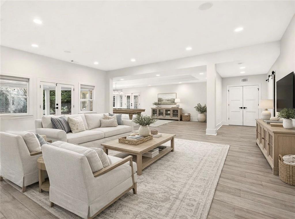 2910 Creek Tree Lane Cumming, GA 30041 - Photo 61 of 75 a living room with furniture or couch and a wooden floor