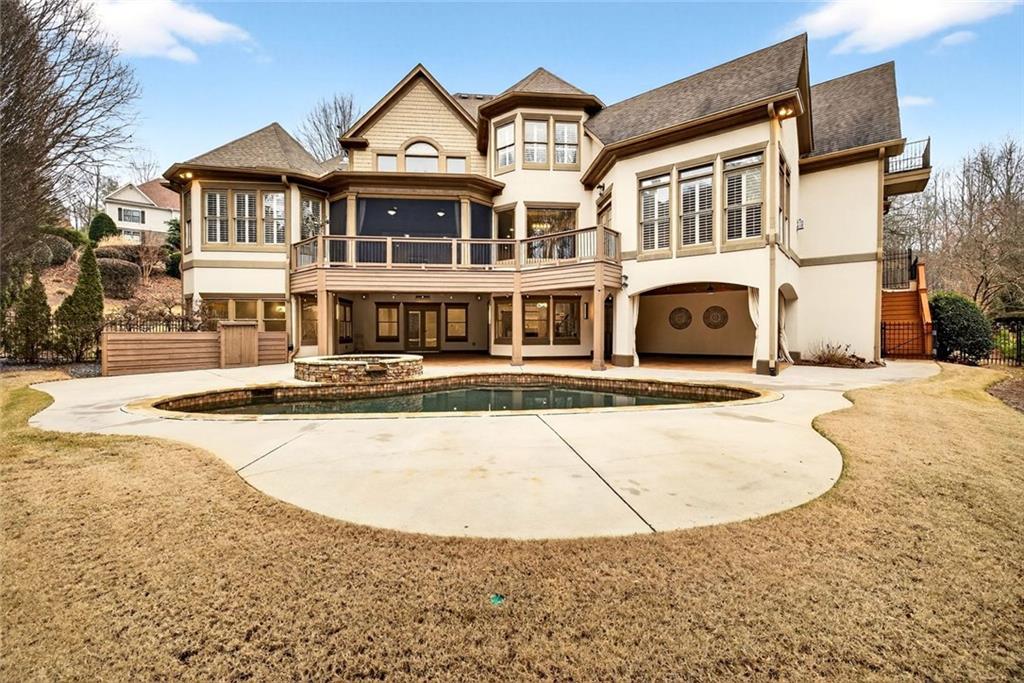 2910 Creek Tree Lane Cumming, GA 30041 - Photo 72 of 75 a front view of a house with swimming pool