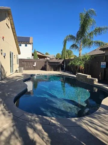 a view of a house with a patio