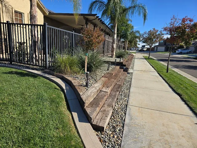 a view of swimming pool with outdoor seating and plants