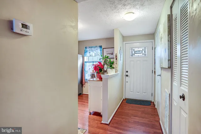 a view of a hallway and interior of house