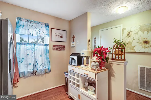 a view of living room with furniture and flowers
