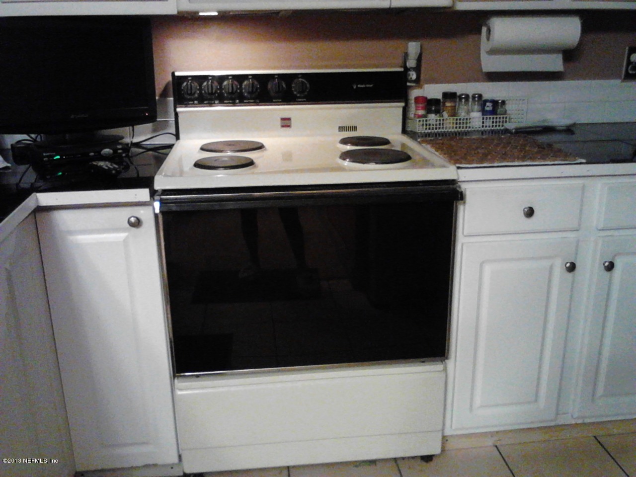 2441 Wattle Tree Road East Jacksonville, FL 32246 - Photo 2 of 13 a kitchen with a sink and a refrigerator