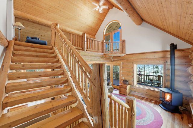 11192 Maple Road, Unit 7 Heber City, UT 84032 - Photo 9 of 51 Soaring cathedral ceilings with exposed wood beams and open-concept architecture create an expansive, light-filled interior