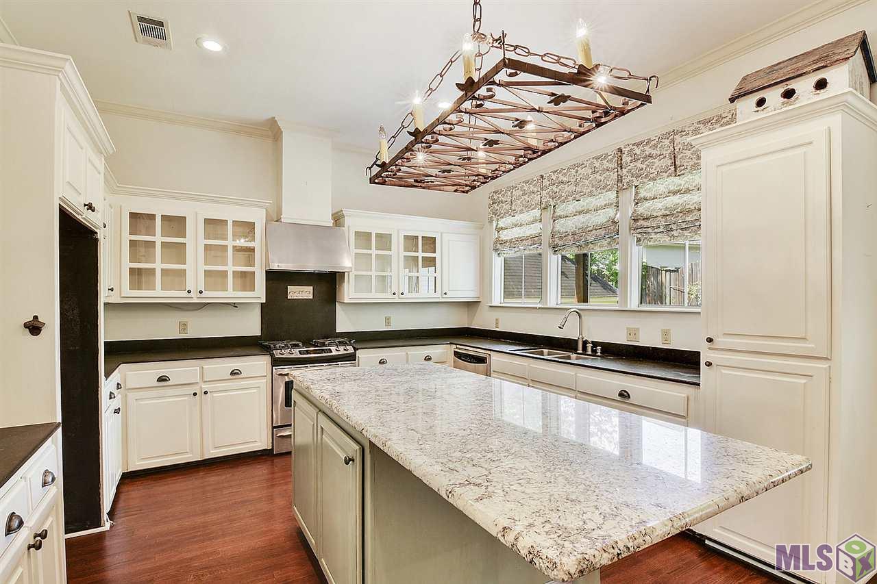 8016 Walden Road Baton Rouge, LA 70808 - Photo 8 of 19 Wall of windows in Kitchen!