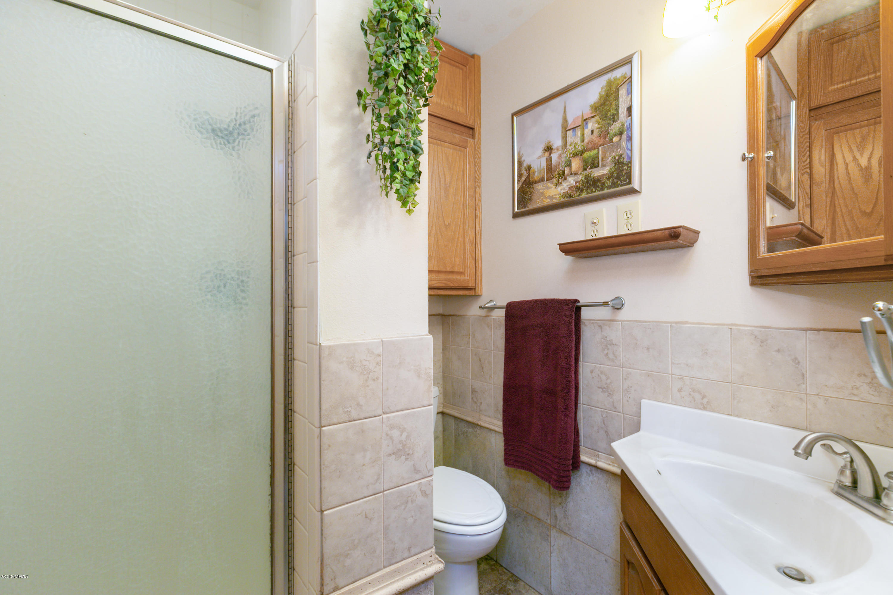 1608 Ahtanum Road Union Gap, WA 98903 - Photo 11 of 18 a bathroom with a toilet and a sink