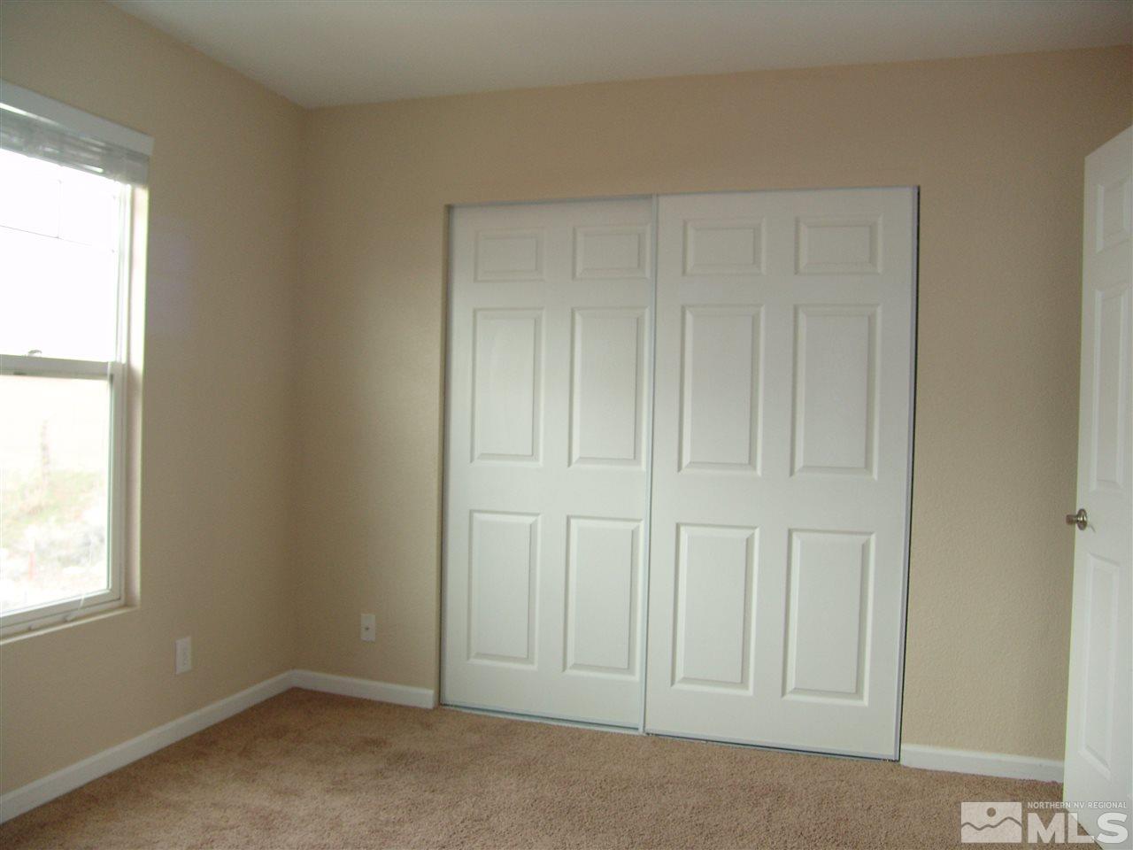 795 Montello Street Reno, NV 89512 - Photo 10 of 13 an empty room with windows