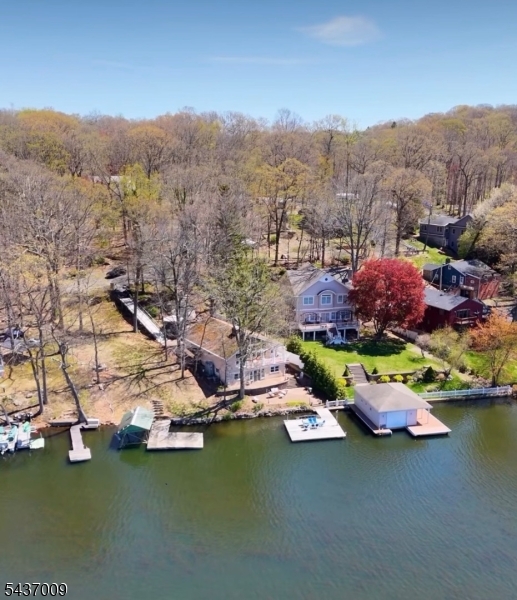 5 Oneida Avenue Hopatcong, NJ 07843 - Photo 3 of 3 an aerial view of a house with a garden and lake view