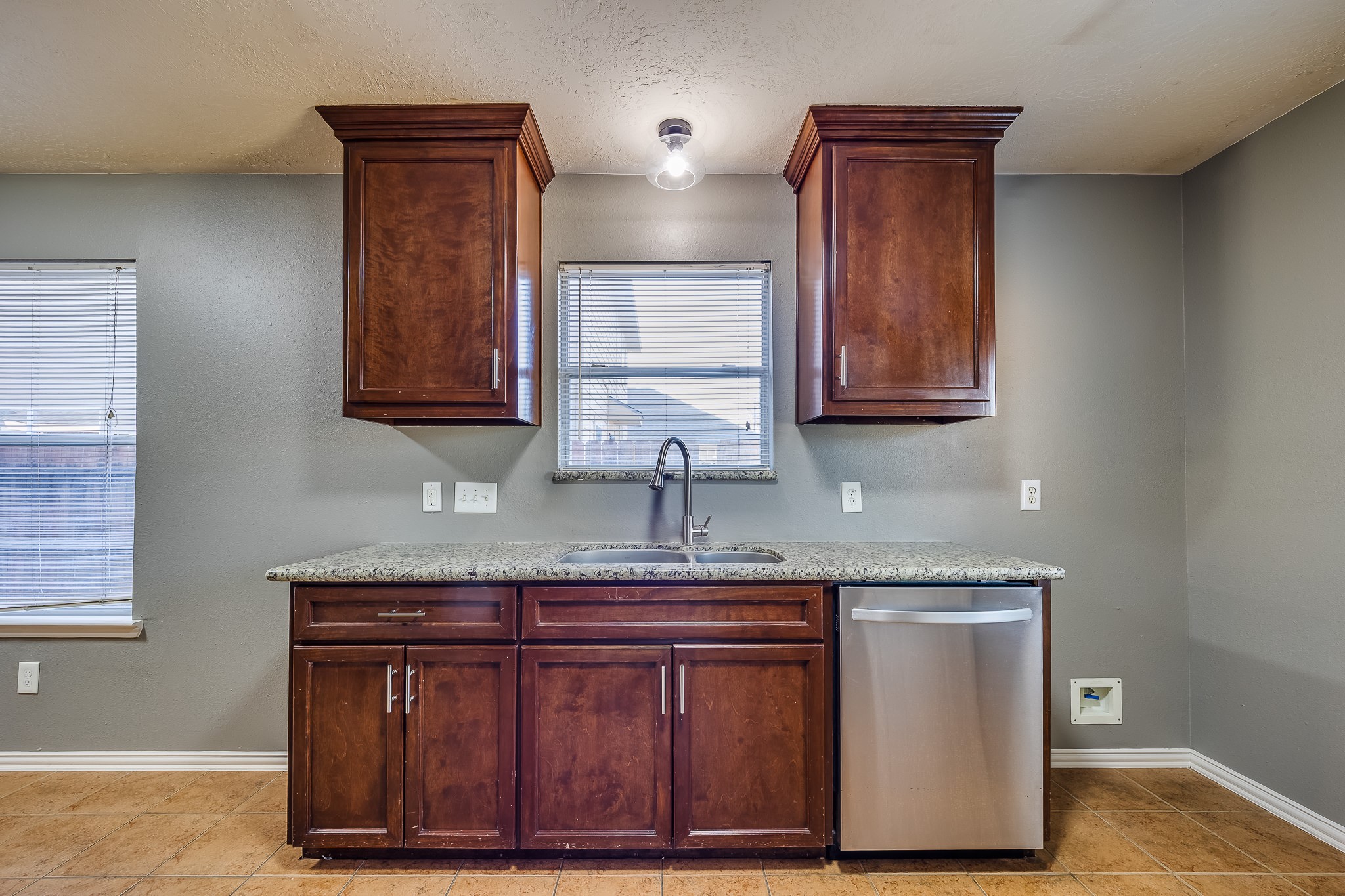 21927 Octavia Way Houston, TX 77073 - Photo 15 of 28 Kitchen featuring ample cabinet storage, offering plenty of space to organize cookware, dishes, and everyday essentials efficiently.