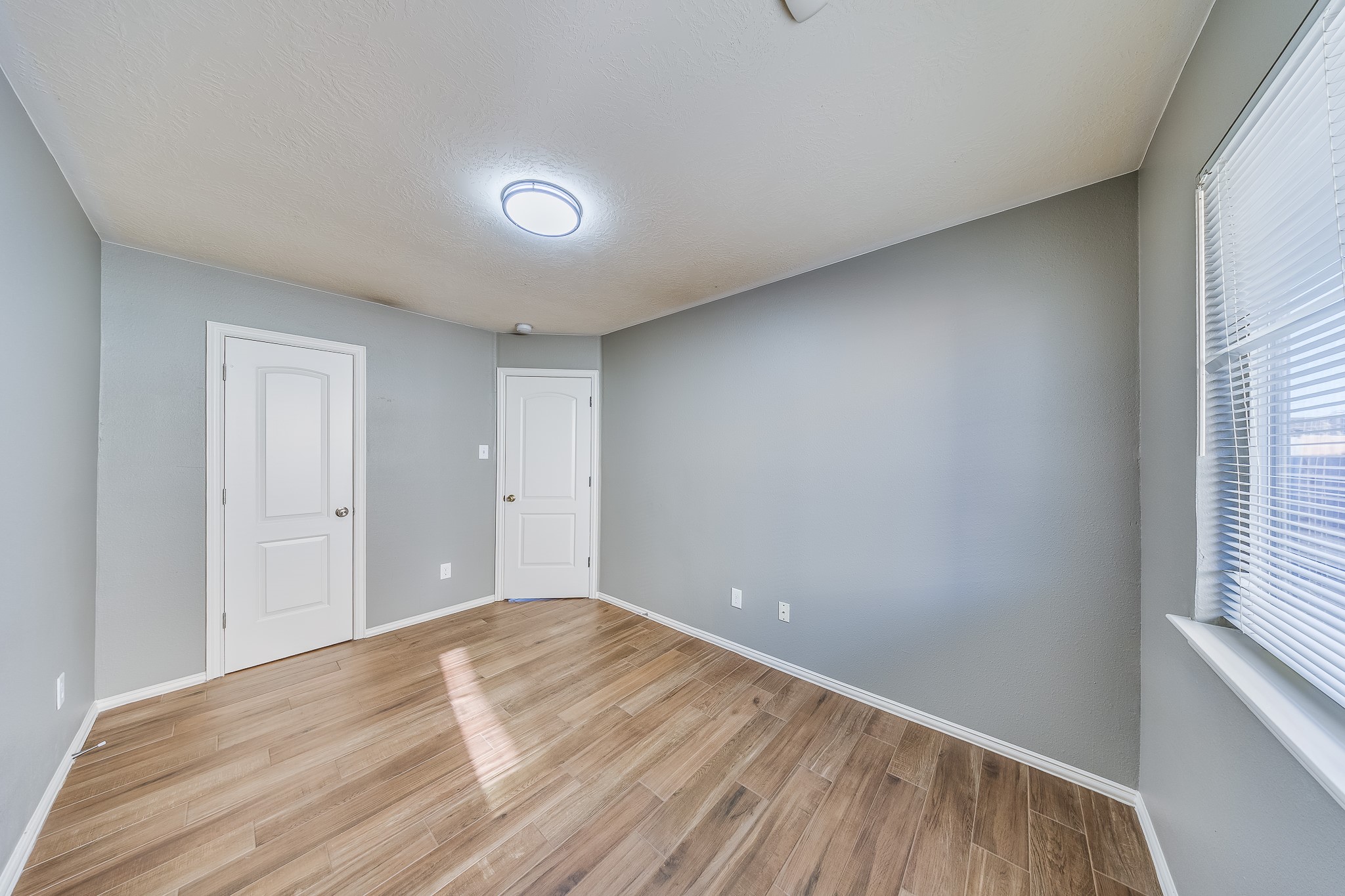 21927 Octavia Way Houston, TX 77073 - Photo 18 of 28 Bedroom 2 with comfortable space, natural light, and versatile layout ideal for guests, office, or personal use.