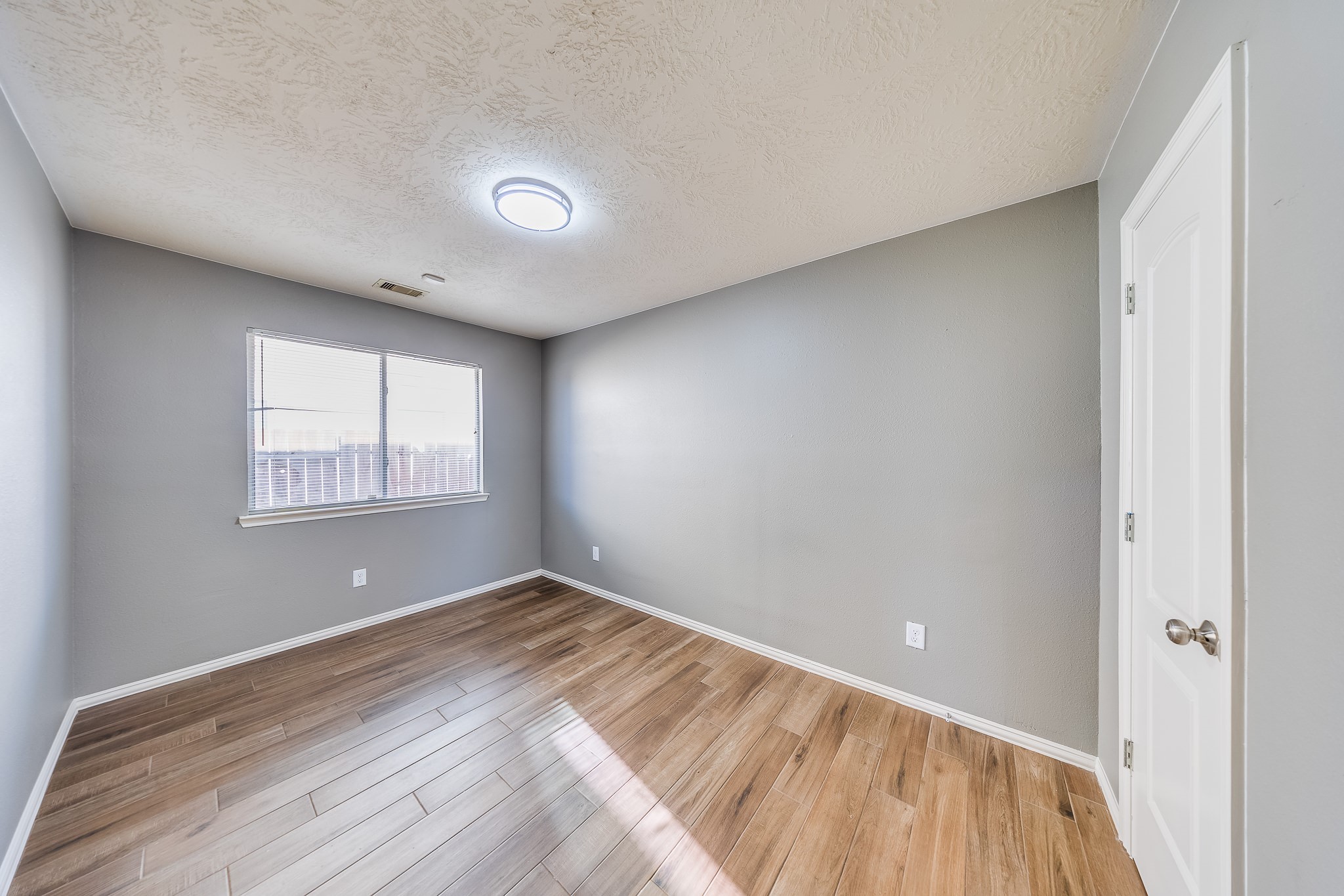 21927 Octavia Way Houston, TX 77073 - Photo 19 of 28 Bedroom 2 with comfortable space, natural light, and versatile layout ideal for guests, office, or personal use.