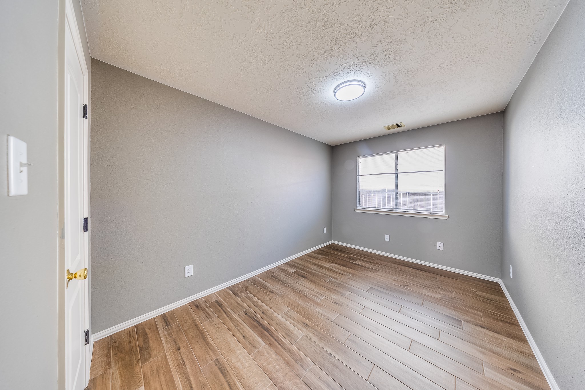 21927 Octavia Way Houston, TX 77073 - Photo 21 of 28 Bedroom 3 offering bright, flexible space perfect for family, guests, or a home office with plenty of natural light.