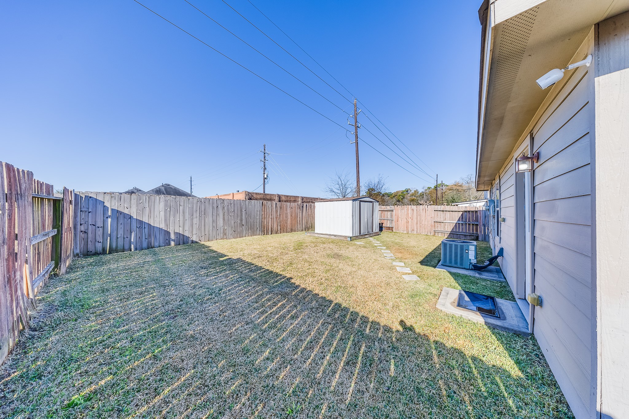 21927 Octavia Way Houston, TX 77073 - Photo 28 of 28 Fenced backyard providing privacy and safety, perfect for kids, pets, or peaceful outdoor relaxation.